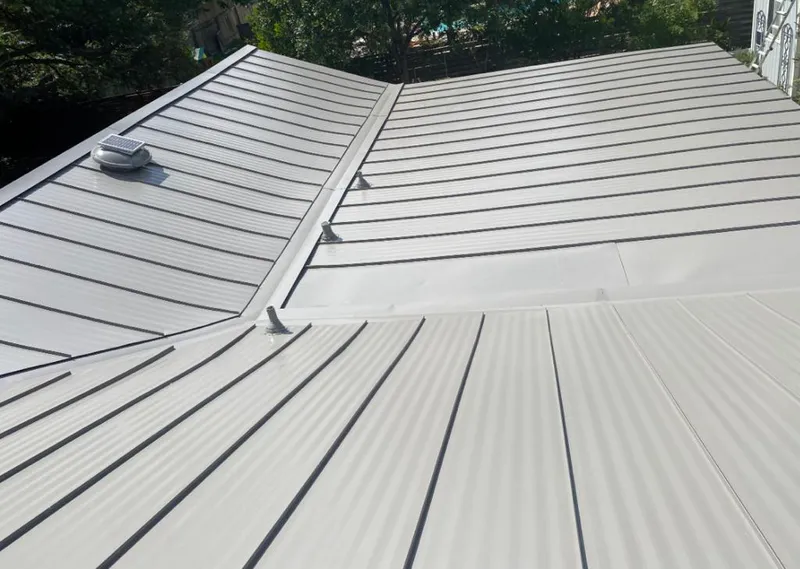 Solar attic fan installed on a metal roof for Roof Ventilation in Rolling Hills Estates